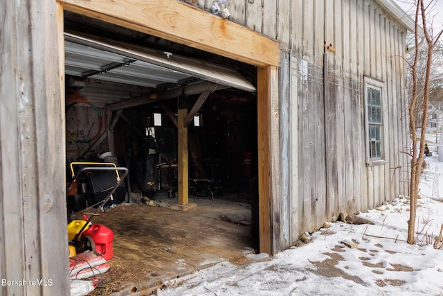 view of snow covered garage