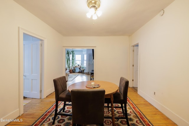 dining area with light hardwood / wood-style flooring