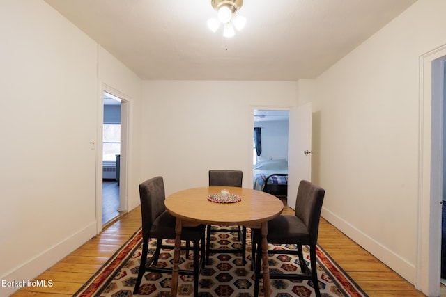 dining room with light wood-type flooring