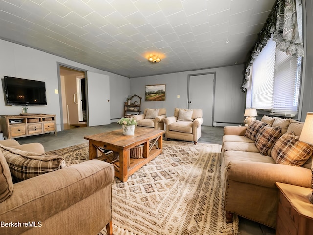 living room with a baseboard heating unit