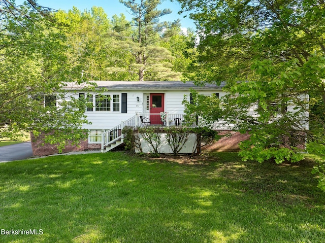 372 Reservoir Rd, North Adams, MA 01247 - ranch-style house featuring a front lawn