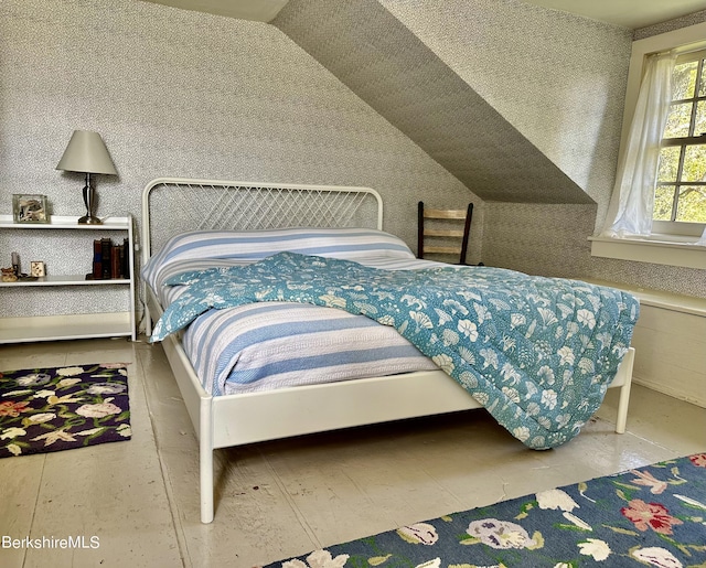 bedroom with vaulted ceiling