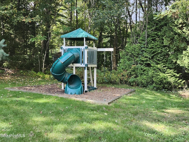 view of play area featuring a lawn