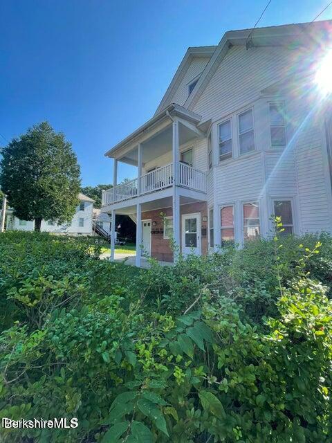 420-436 N Houghton St, Clarksburg, MA 01247 - rear view of property with a balcony