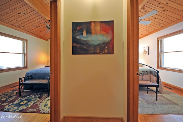 55 Mallard Dr, Becket, MA 01223 - hall with wood ceiling, plenty of natural light, and wood-type flooring