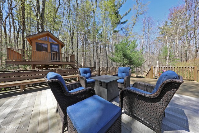 55 Mallard Dr, Becket, MA 01223 - wooden terrace featuring an outdoor hangout area