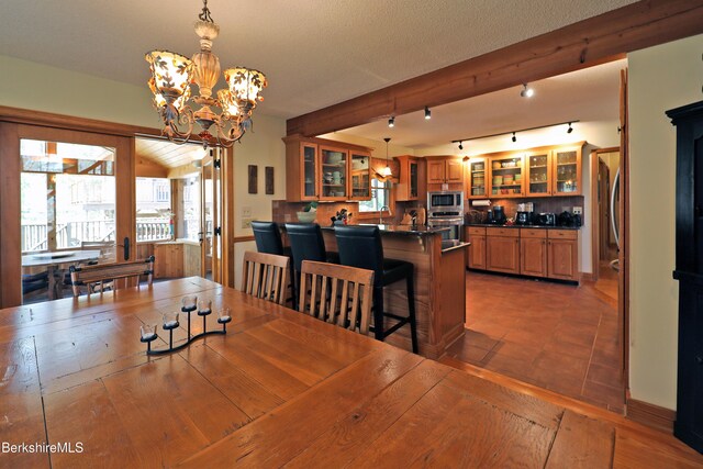 55 Mallard Dr, Becket, MA 01223 - dining area with a chandelier