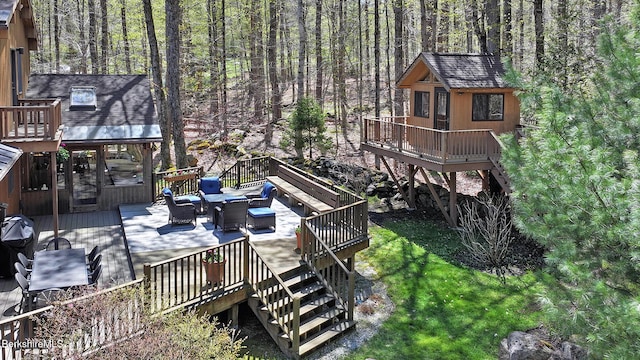 55 Mallard Dr, Becket, MA 01223 - wooden deck featuring stairway, a wooded view, and an outdoor structure
