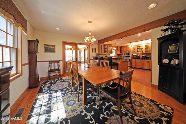 55 Mallard Dr, Becket, MA 01223 - dining area with a chandelier, healthy amount of natural light, light wood-style floors, and recessed lighting