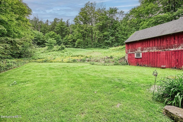 132 Sandisfield Rd, Sandisfield, MA 01255 - view of green lawn featuring an outbuilding and a barn