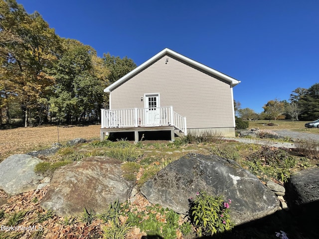 rear view of house with a deck