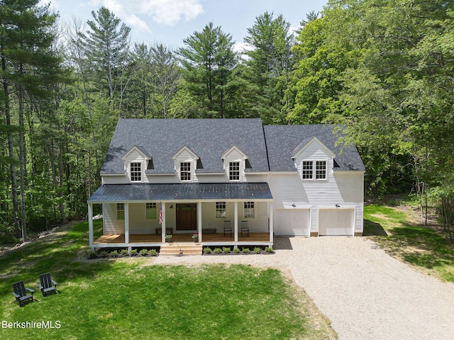 60 Parsley Ln, Sheffield, MA 01257 - cape cod-style house with covered porch, gravel driveway, a front yard, and an attached garage