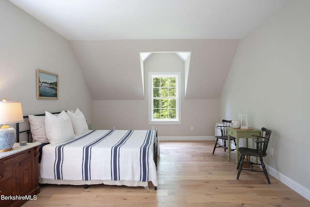 60 Parsley Ln, Sheffield, MA 01257 - bedroom with light wood finished floors, lofted ceiling, and baseboards