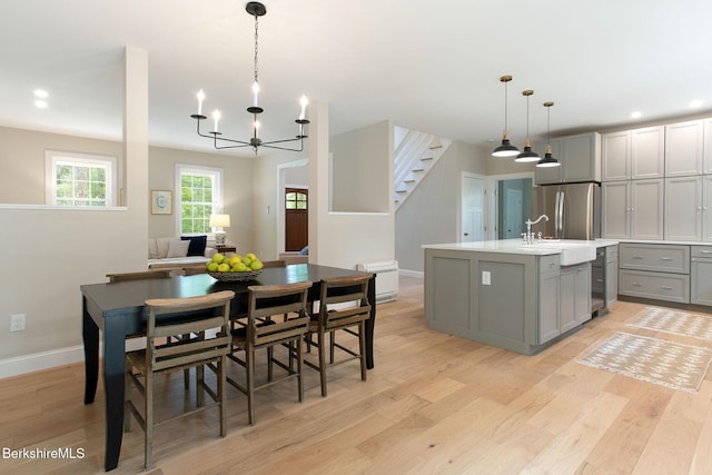60 Parsley Ln, Sheffield, MA 01257 - dining space featuring a chandelier, light wood-type flooring, stairs, recessed lighting, and baseboards