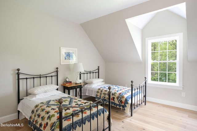 60 Parsley Ln, Sheffield, MA 01257 - bedroom with light wood-style flooring, vaulted ceiling, and baseboards