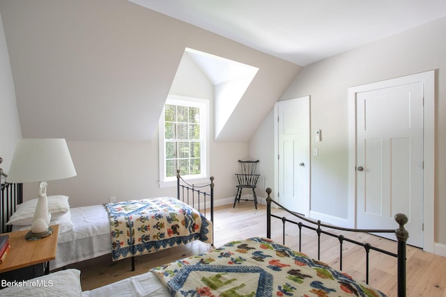 60 Parsley Ln, Sheffield, MA 01257 - bedroom featuring light wood-style floors, lofted ceiling, and baseboards