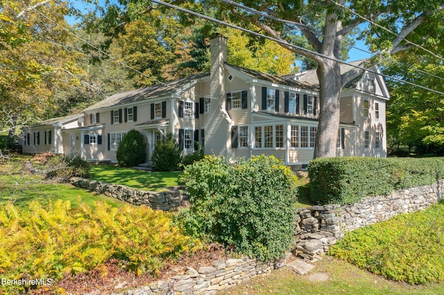 colonial house with a front lawn