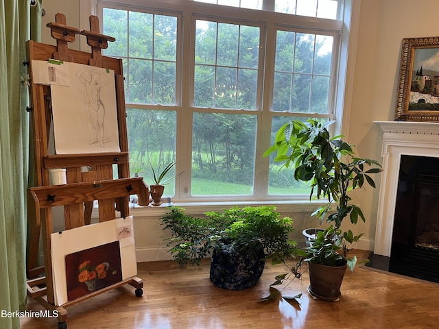 4 Evergreen Trl Unit 4, Lenox, MA 01240 - sitting room with a fireplace with flush hearth and wood finished floors