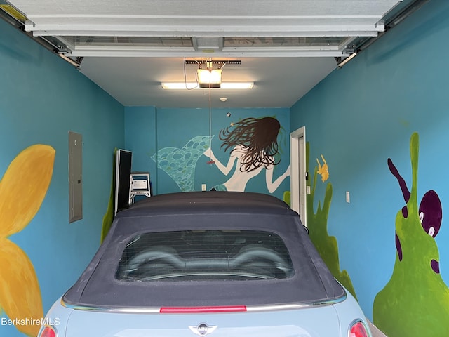 4 Evergreen Trl Unit 4, Lenox, MA 01240 - garage with a garage door opener and electric panel