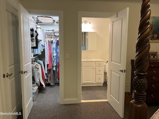 4 Evergreen Trl Unit 4, Lenox, MA 01240 - walk in closet with dark carpet