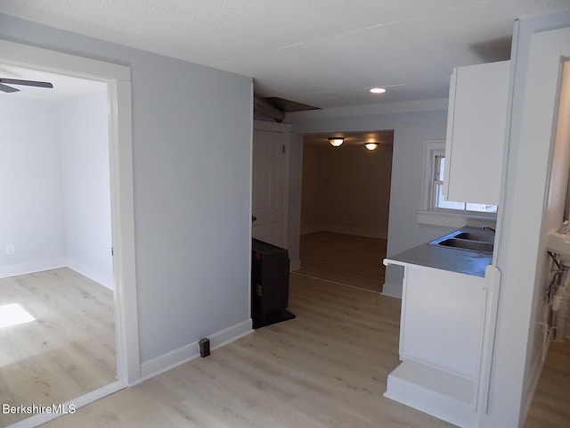 115 Commercial St, Adams, MA 01220 - corridor with a sink, baseboards, recessed lighting, and light wood-style flooring