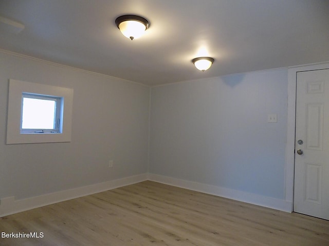 115 Commercial St, Adams, MA 01220 - empty room with baseboards, ornamental molding, and light wood-style flooring