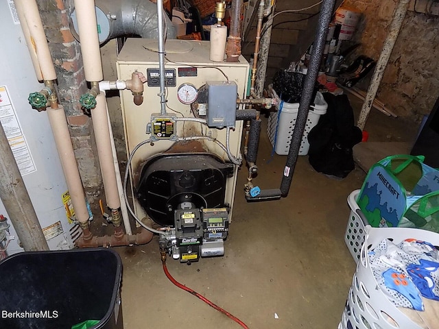 115 Commercial St, Adams, MA 01220 - utility room featuring a heating unit and water heater