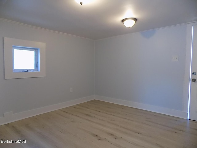 115 Commercial St, Adams, MA 01220 - spare room with crown molding, baseboards, and light wood finished floors