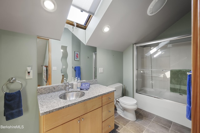 83 Hancock Rd, Pittsfield, MA 01201 - bathroom featuring a skylight, vanity, lofted ceiling, and shower / bath combination with glass door