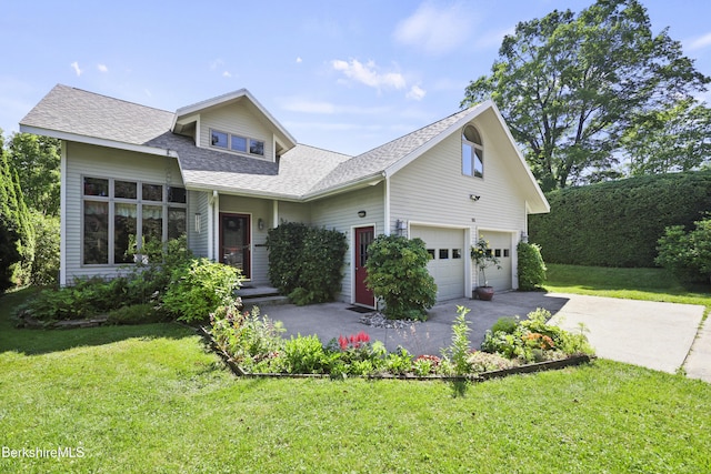 83 Hancock Rd, Pittsfield, MA 01201 - view of front of house with asphalt driveway, a shingled roof, and a front yard