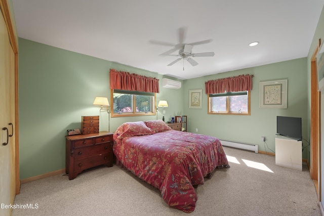 83 Hancock Rd, Pittsfield, MA 01201 - carpeted bedroom with a wall mounted air conditioner, a baseboard radiator, a ceiling fan, and recessed lighting
