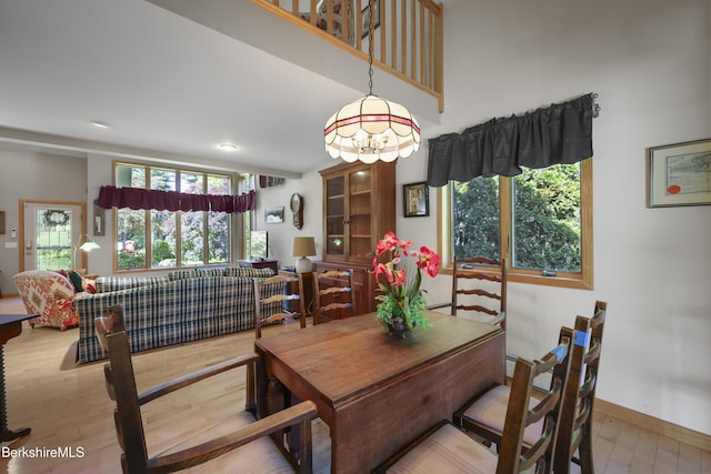 83 Hancock Rd, Pittsfield, MA 01201 - dining room featuring wood finished floors and a chandelier