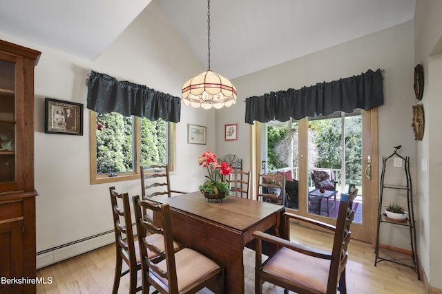 83 Hancock Rd, Pittsfield, MA 01201 - dining space featuring a baseboard radiator, light wood-style floors, and lofted ceiling