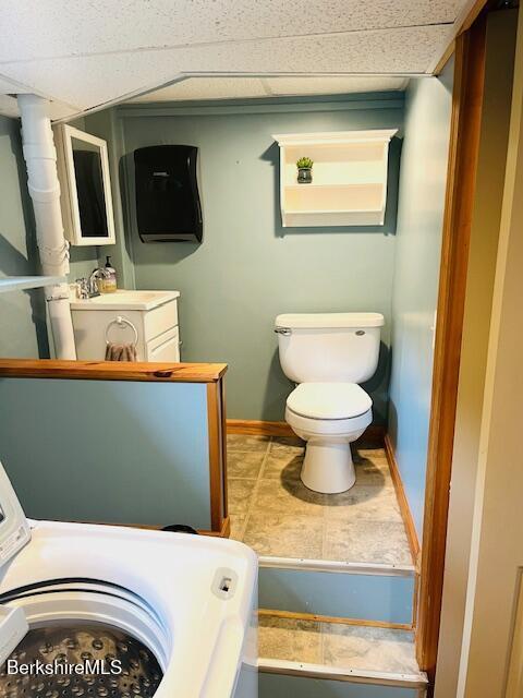 60 Summer St, Lanesborough, MA 01237 - bathroom featuring washer / clothes dryer and tile patterned flooring