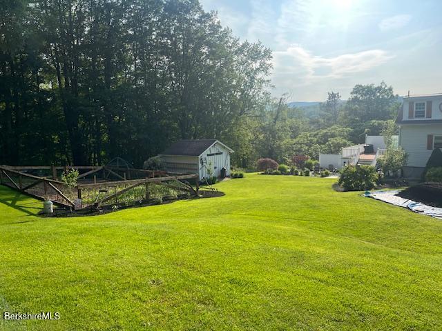 60 Summer St, Lanesborough, MA 01237 - view of green lawn featuring a storage unit