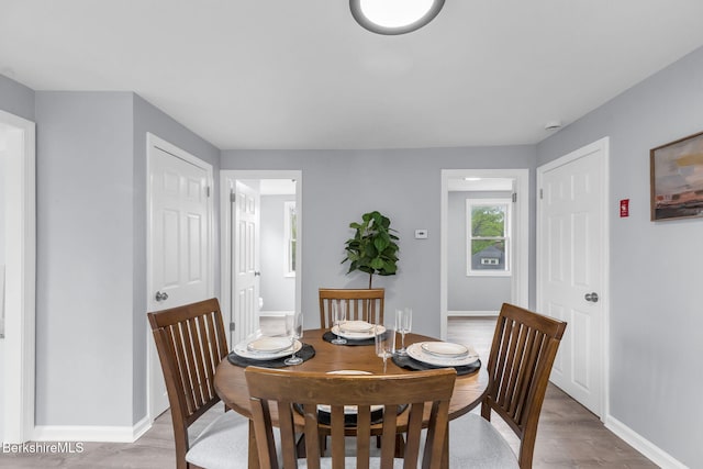 90 Maple St, Lee, MA 01238 - dining space with baseboards and wood finished floors