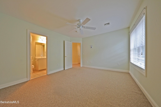 33 Alpine Trl, Pittsfield, MA 01201 - unfurnished bedroom featuring light colored carpet, baseboards, connected bathroom, and a ceiling fan