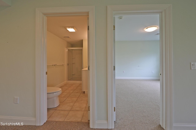 33 Alpine Trl, Pittsfield, MA 01201 - hallway featuring baseboards, tile patterned floors, and carpet