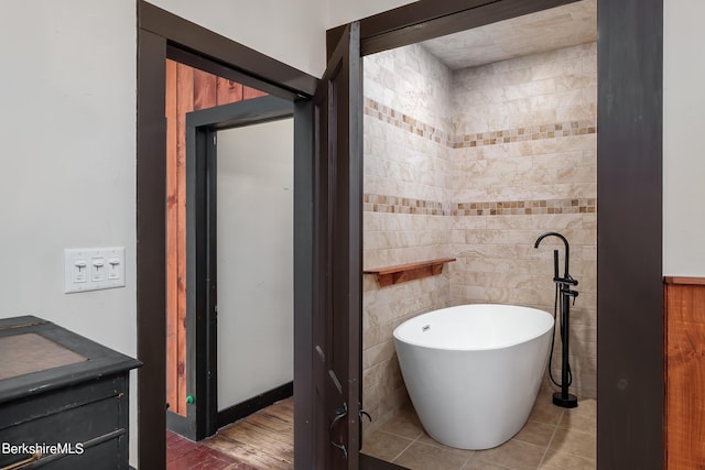 196 S St, Williamstown, MA 01267 - full bathroom with a freestanding bath, tile walls, and vanity