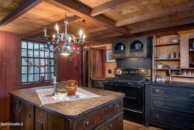 196 S St, Williamstown, MA 01267 - kitchen with black electric range oven, a wooden ceiling with exposed beams, a chandelier, dark countertops, and a center island