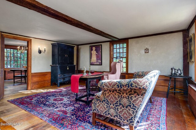 196 S St, Williamstown, MA 01267 - living room featuring wood finished floors, wainscoting, and beam ceiling