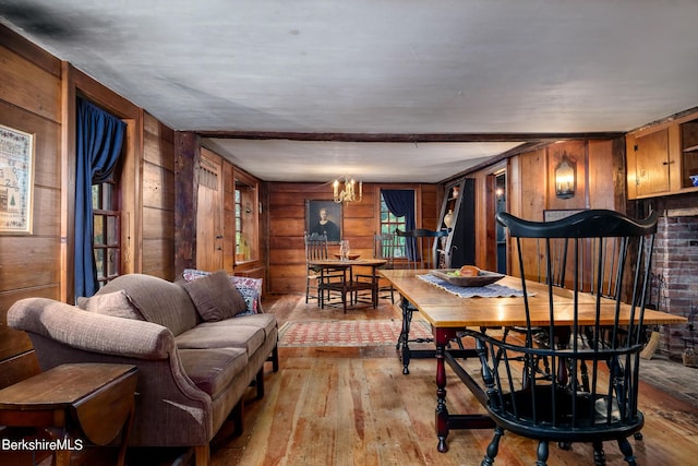 196 S St, Williamstown, MA 01267 - dining area with light wood-type flooring, wood walls, and a chandelier
