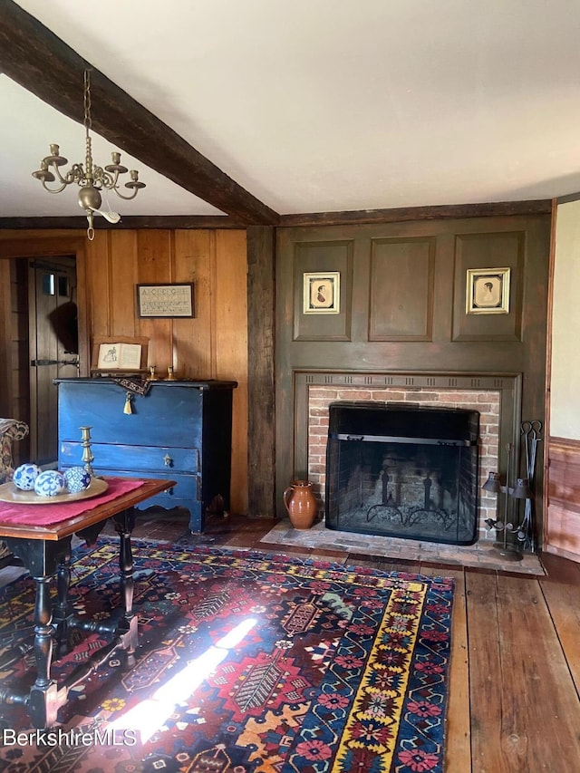 196 S St, Williamstown, MA 01267 - living room with wood-type flooring, a fireplace, and wood walls