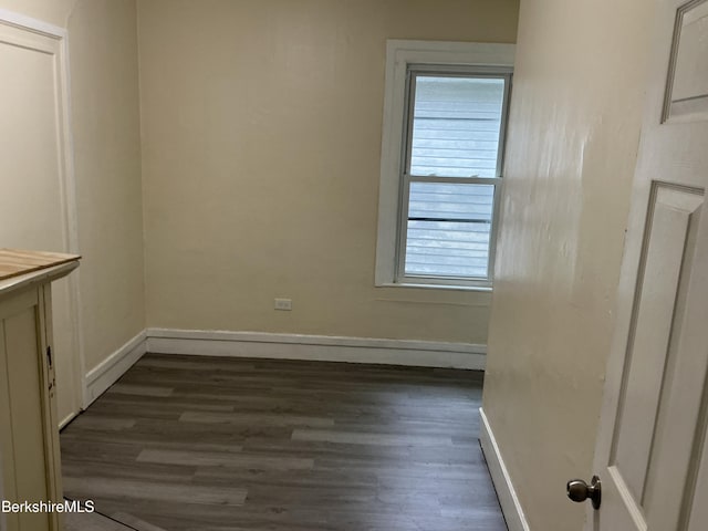 51-53 Adam St, Pittsfield, MA 01201 - spare room with dark wood-type flooring