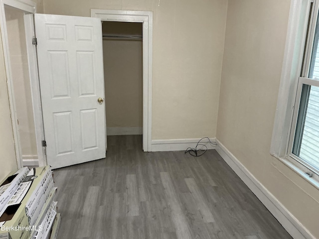 51-53 Adam St, Pittsfield, MA 01201 - unfurnished bedroom with dark wood-style floors and a closet