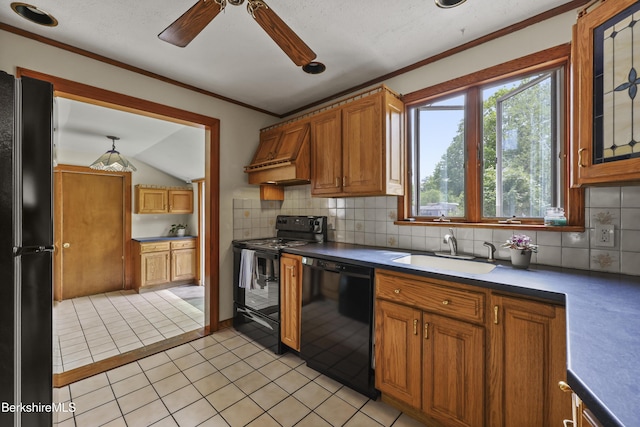 kitchen featuring black appliances, a sink, ceiling fan, crown molding, and decorative backsplash