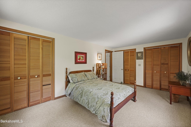 126 Christian Hill Rd, Great Barrington, MA 01230 - bedroom featuring two closets and carpet flooring