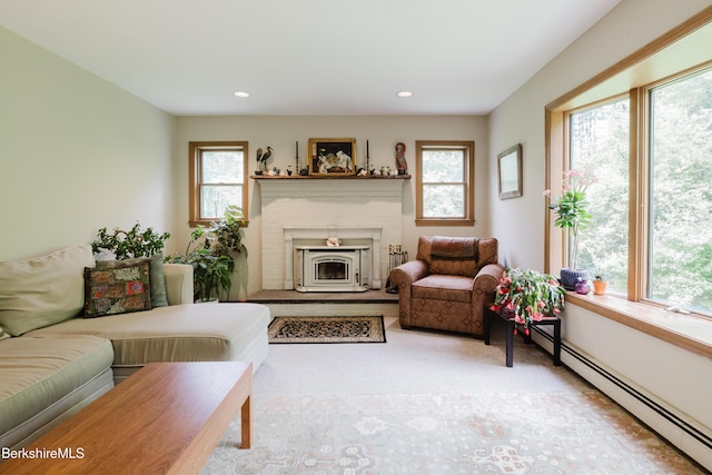126 Christian Hill Rd, Great Barrington, MA 01230 - living room with baseboard heating, healthy amount of natural light, recessed lighting, and a fireplace with raised hearth