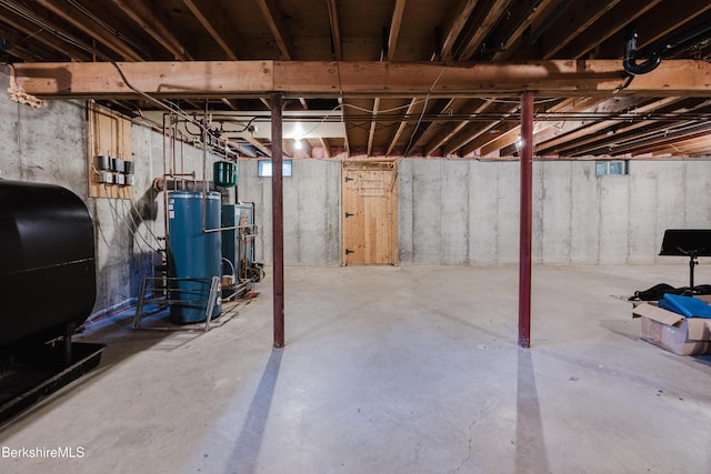 126 Christian Hill Rd, Great Barrington, MA 01230 - unfinished below grade area featuring oil tank and gas water heater