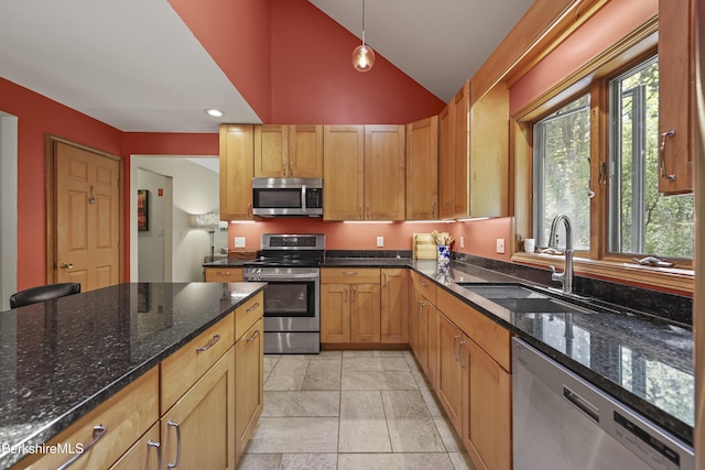 126 Christian Hill Rd, Great Barrington, MA 01230 - kitchen featuring appliances with stainless steel finishes, dark stone countertops, recessed lighting, high vaulted ceiling, and pendant lighting